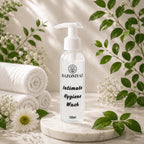 Razo Niyaz Intimate Hygiene Wash 120ml pump bottle on marble with white towels and green leaves.